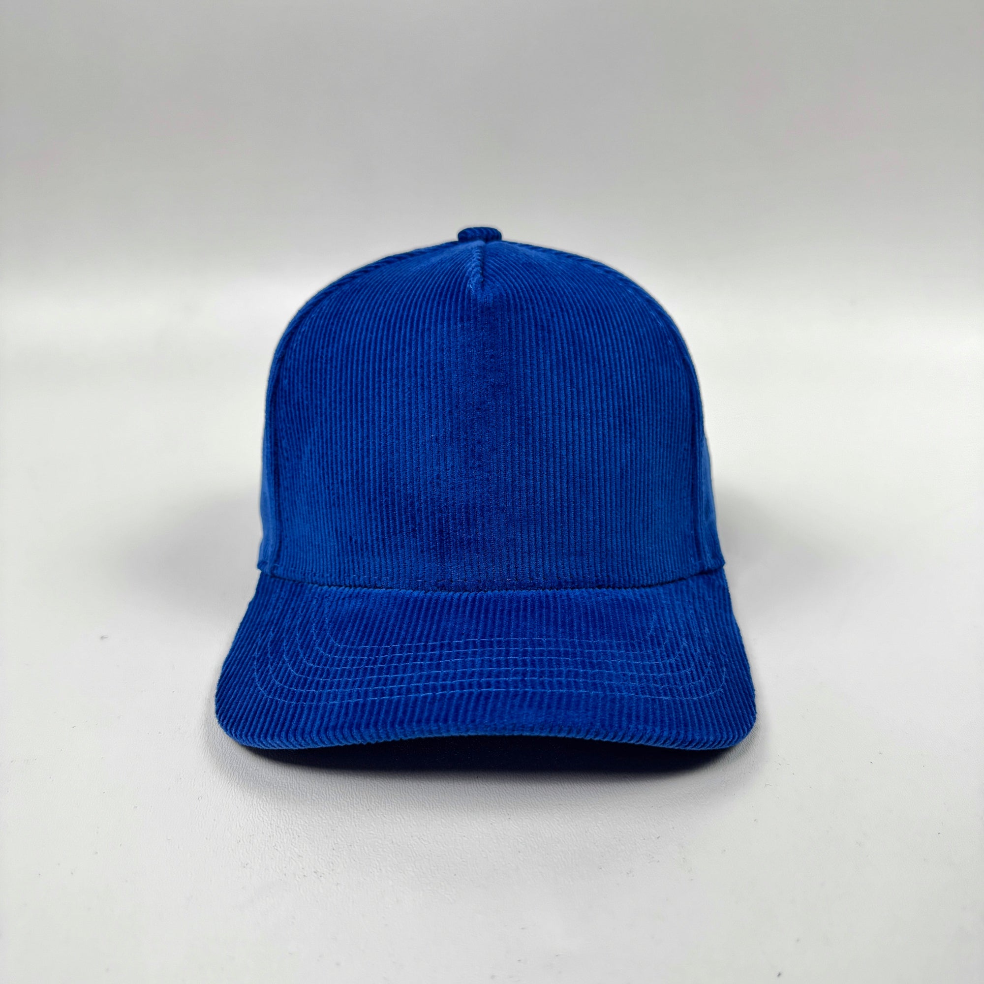 Blue cap on a white background