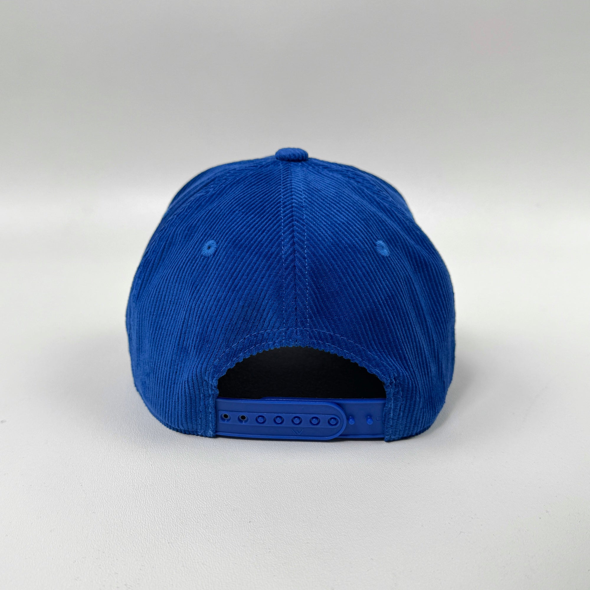 Blue cap on a white background
